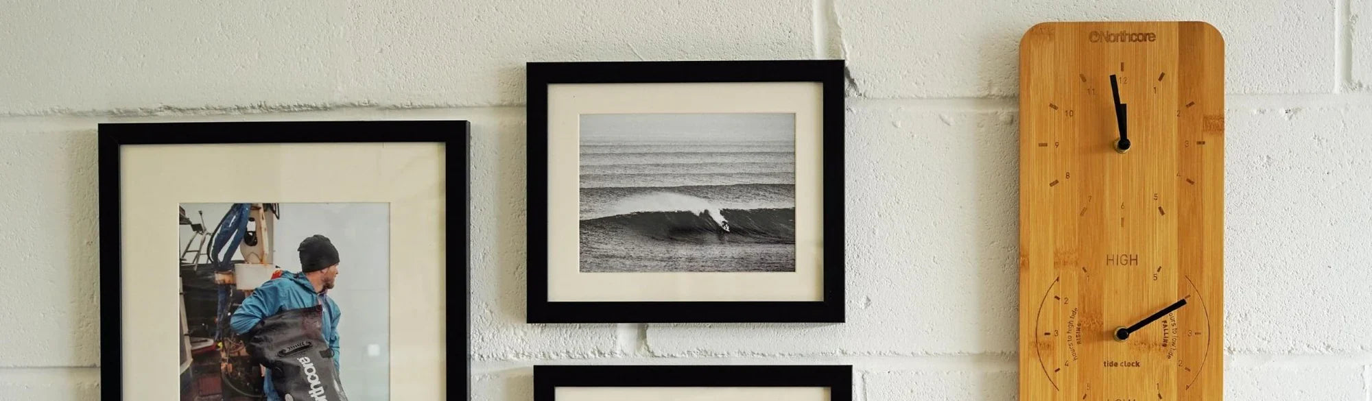A person looking at unique surf-themed gifts and gadgets at the Noordzee Boardstore in The Hague. Noordzee Boardstore surfshop Surfschool webshop surfboardrepairs Scheveningen